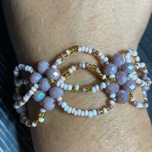 Handmade purple floral pattern seed beaded bracelet.